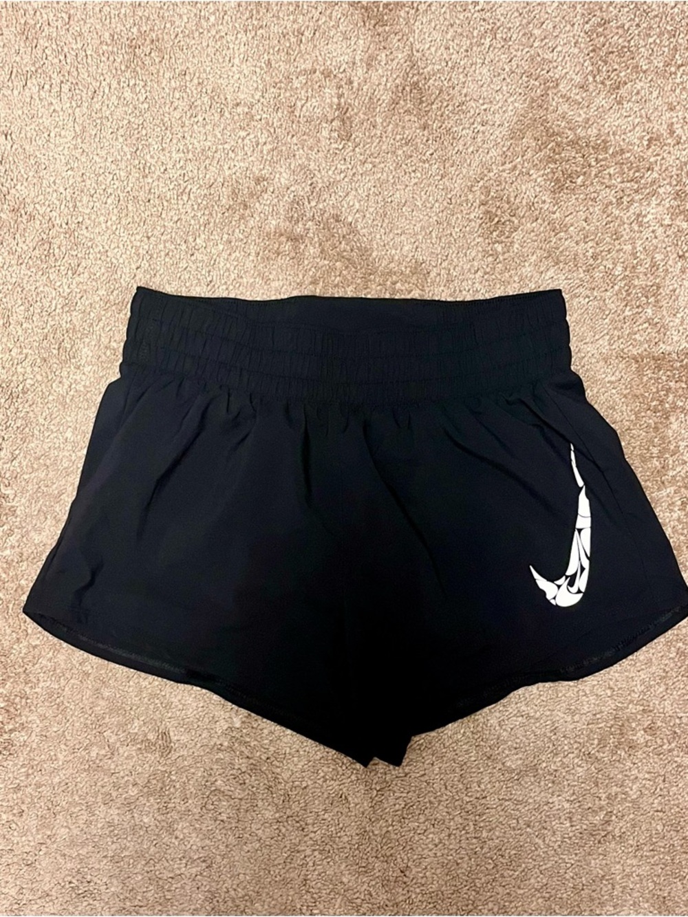Nike Black Women's Athletic Running Shorts with White Swoosh Accent
